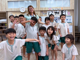 Children from Little Seeds Preschool smiling brightly with the blog author.
